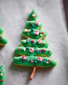 Decorated Christmas tree cookie.
