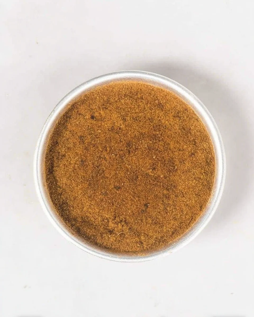 Press the biscuit base firmly into a prepared baking tin.