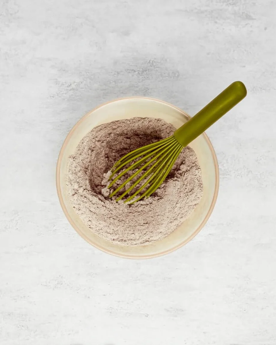 Dry ingredients mixed in a bowl.