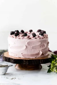Lavender cake on wooden cake stand