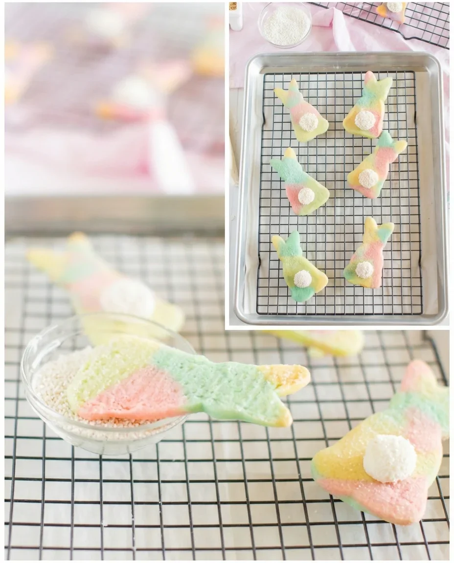 Colorful marbled Easter bunny cut-out cookies decorated with sprinkles and icing.