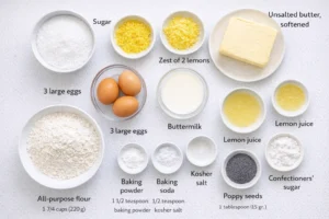 Measured ingredients arranged for Lemon Poppy Seed Loaf Cake: 1 cup (200 grams) sugar, zest of 2 lemons, 1/2 cup (113 grams, 1 stick) unsalted butter, softened, 3 large eggs, 1/2 cup (120 grams) buttermilk, 3 tablespoons