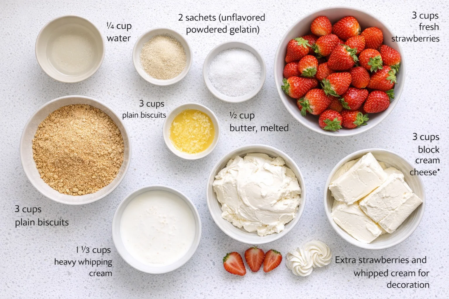 Measured ingredients arranged for No-Bake Strawberry Cheesecake Recipe: ¼ cup (2fl oz/60 ml) water, 2 sachets (16 g/5 teaspoons) unflavored powdered gelatin, 3 cups (9 oz/255 g) plain biscuits (graham crackers or digesti