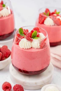 Raspberry mousse in a glass.