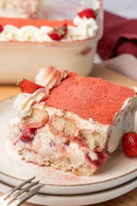 Strawberry tiramisu on a plate.