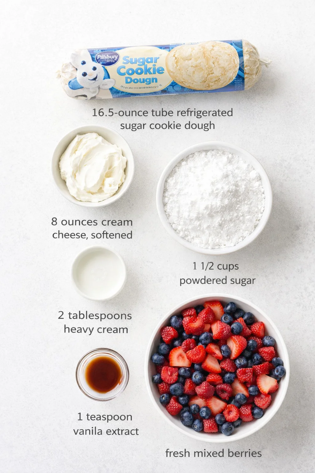 Measured ingredients arranged for Mini Berry Tarts - Lovely Little Kitchen: One 16.5-ounce tube refrigerated sugar cookie dough (Pillsbury or similar), 8 ounces cream cheese, softened to room temperature, 2 tablespoons h