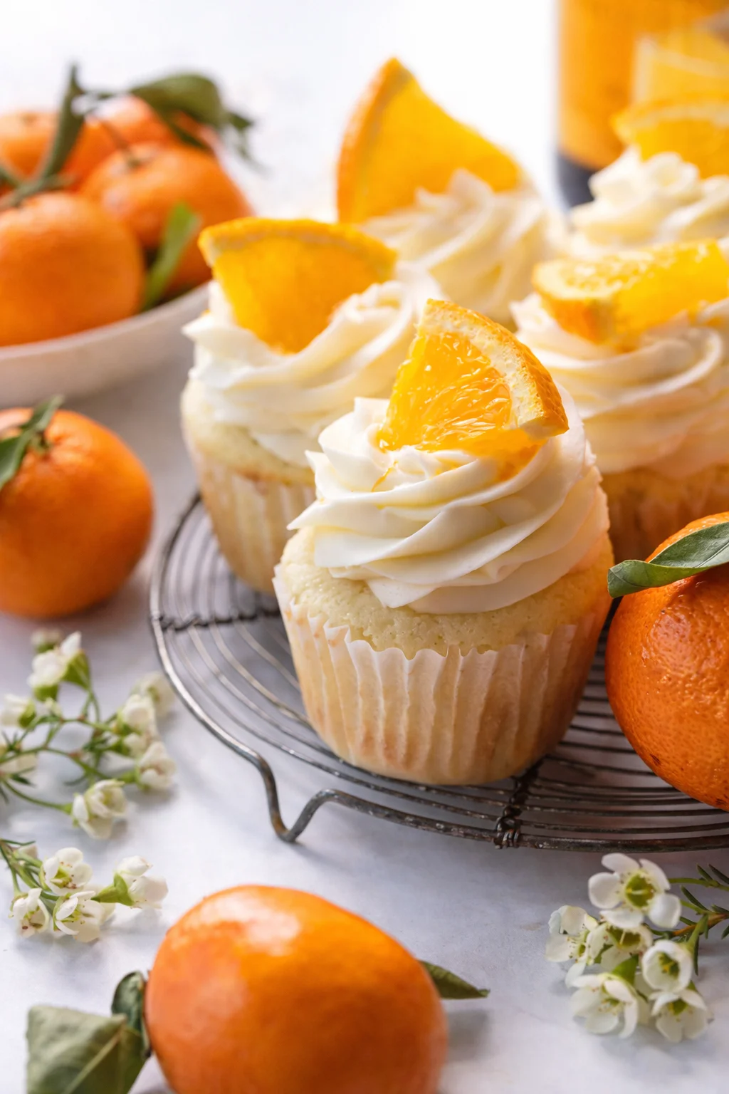 Final plated How to Make Mimosa Cupcakes - Baker by Nature served as a hero shot