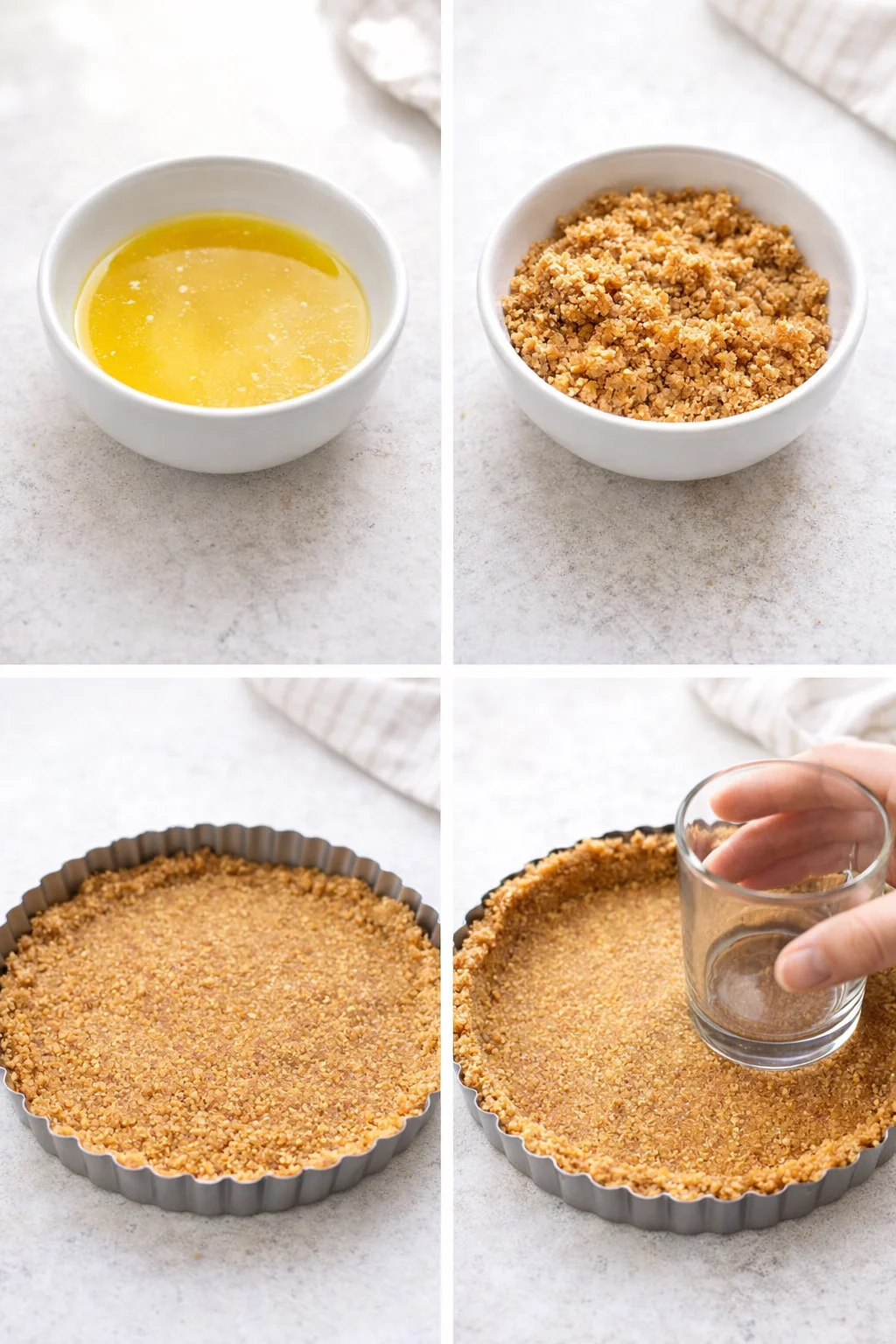 Melted butter-coated cookie crumbs being pressed evenly into a 9-inch tart pan with a glass