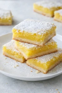 Final plated Best Ever Lemon Bars with Buttery Shortbread Crust served as a hero shot