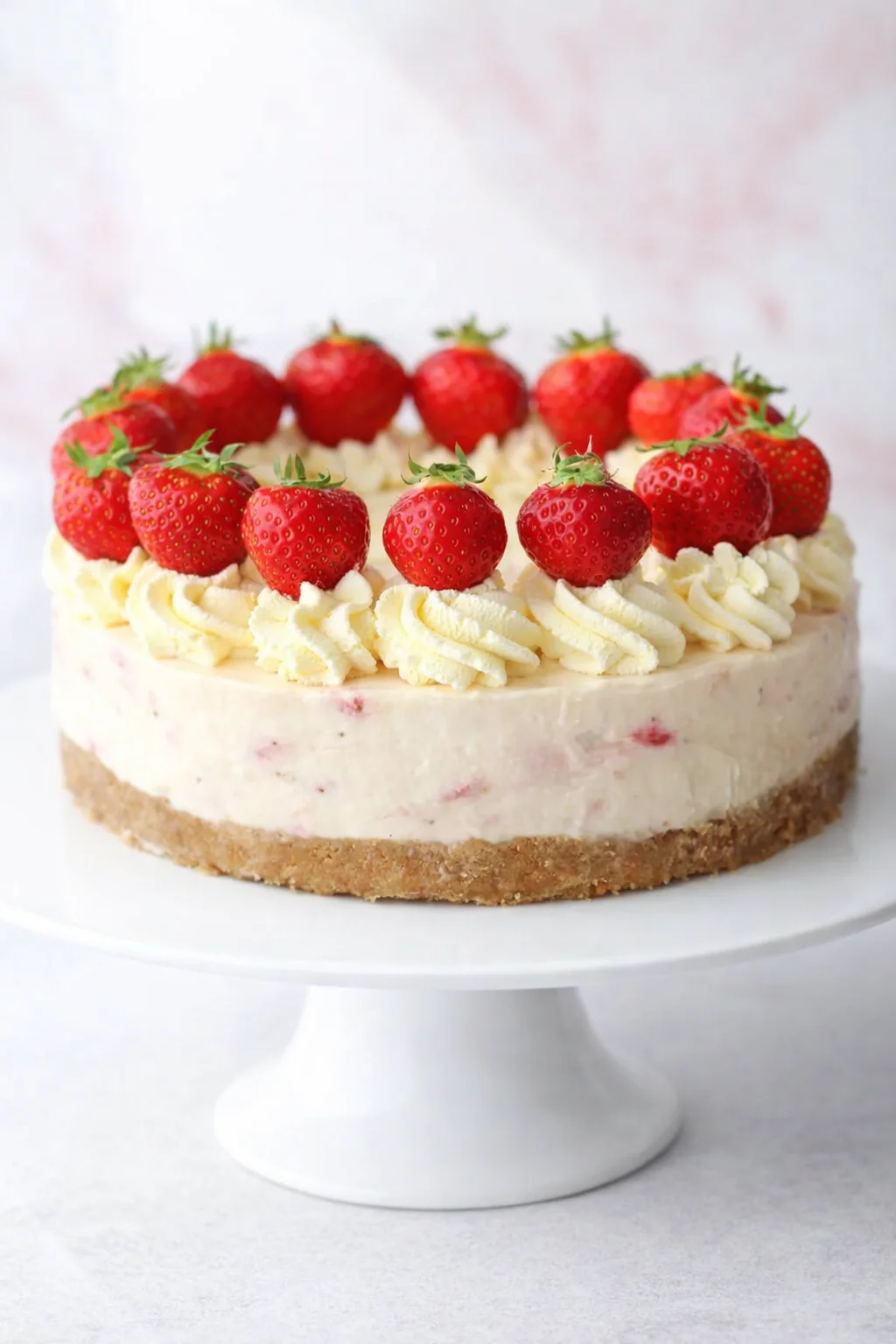 Final plated No-Bake Strawberry White Chocolate Cheesecake - Baker Jo served as a hero shot