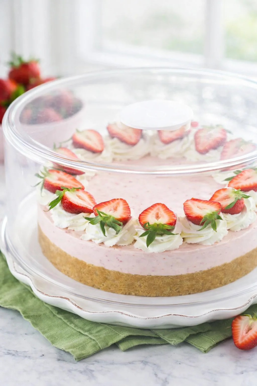 Finished cheesecake chilled in refrigerator, wrapped or covered until ready to serve.