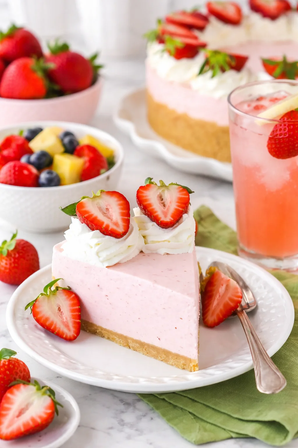 Alternative angle of Easy No Bake Strawberry Cheesecake - The Perfect Strawberry Dessert served with a pairing