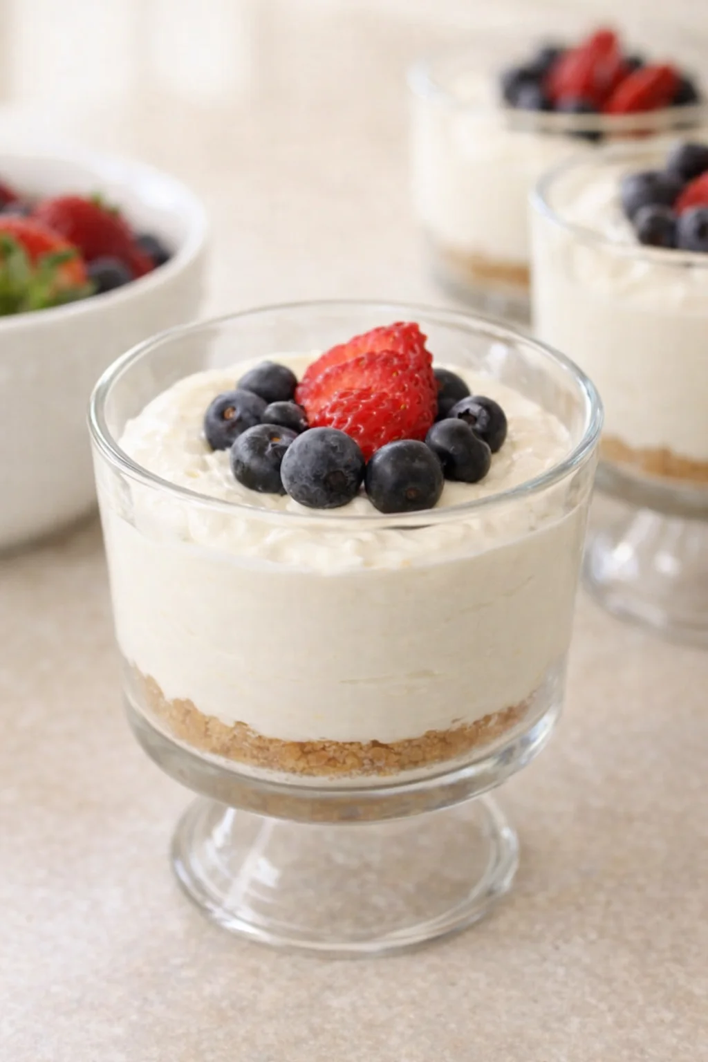 Final plated Individual No-Bake Cheesecake Cups served as a hero shot