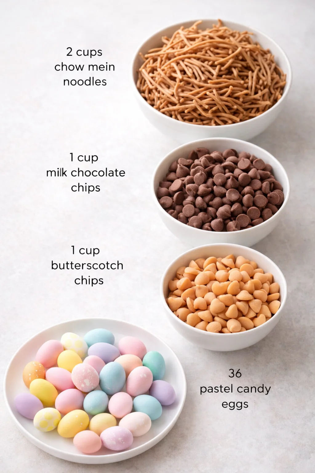 Measured ingredients arranged for Birds Nest Cookies Even Grandma Will Beg For: 2 cups chow mein noodles (or try crushed pretzel sticks if you like a salty-sweet mix), 1 cup milk chocolate chips, 1 cup butterscotch chips