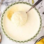 overhead shot of a dish of fluff with a scoop being taken out of a scooper