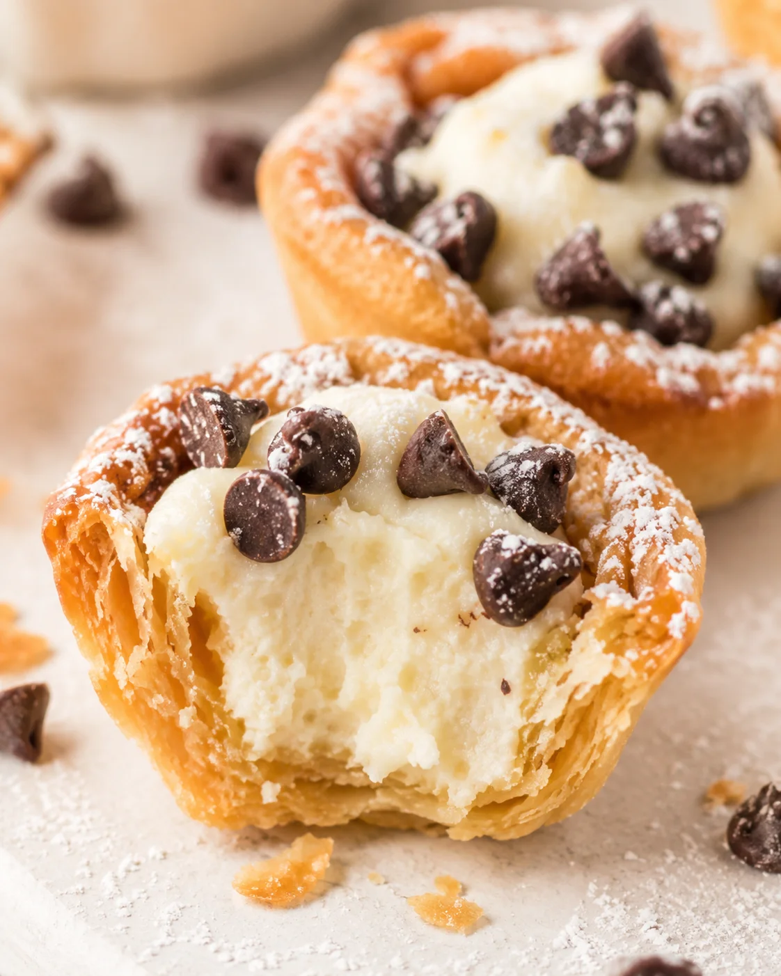 Close-up of delicious mini cannoli cups with chocolate chips on top