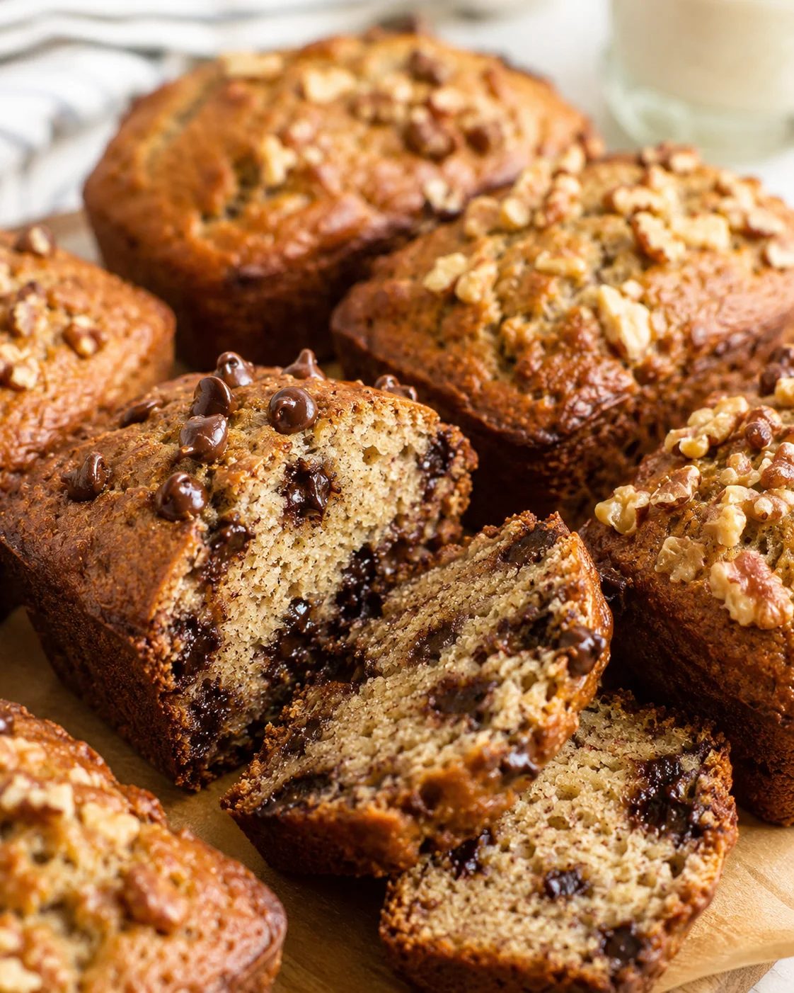 Close-up of moist mini banana bread loaves with chocolate chips and nuts