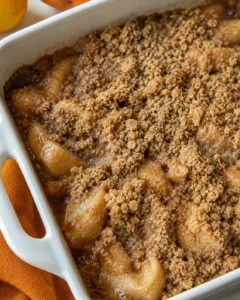 Freshly baked pear crumble topped with a buttery cinnamon streusel.
