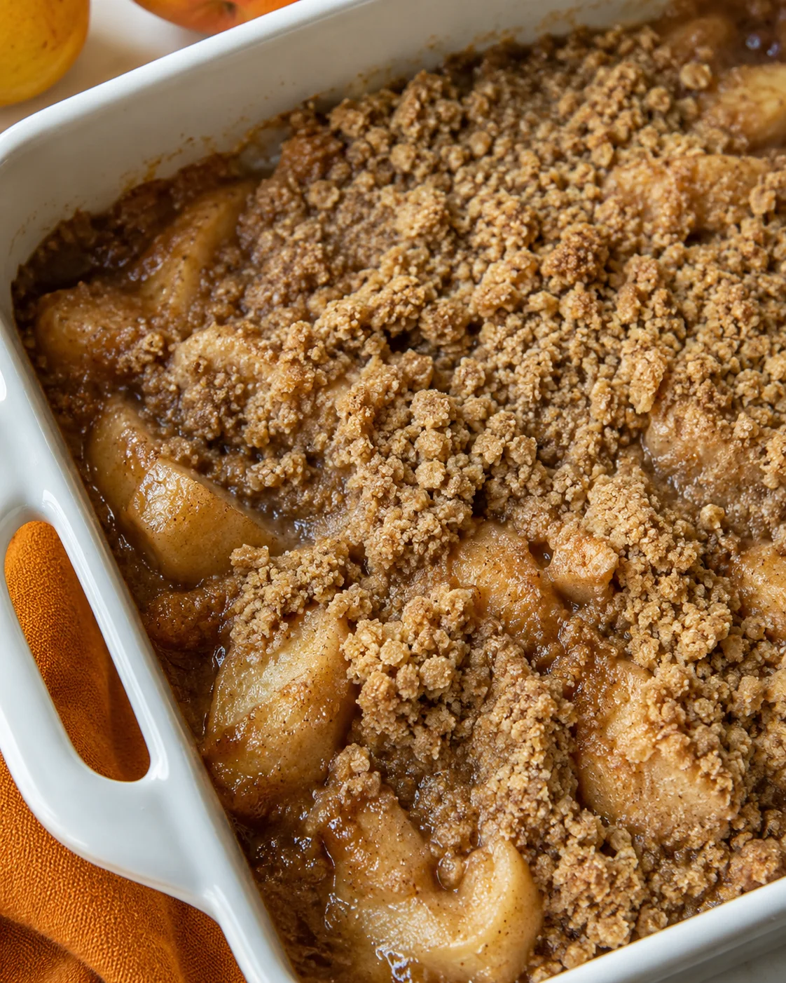 Freshly baked pear crumble topped with a buttery cinnamon streusel.