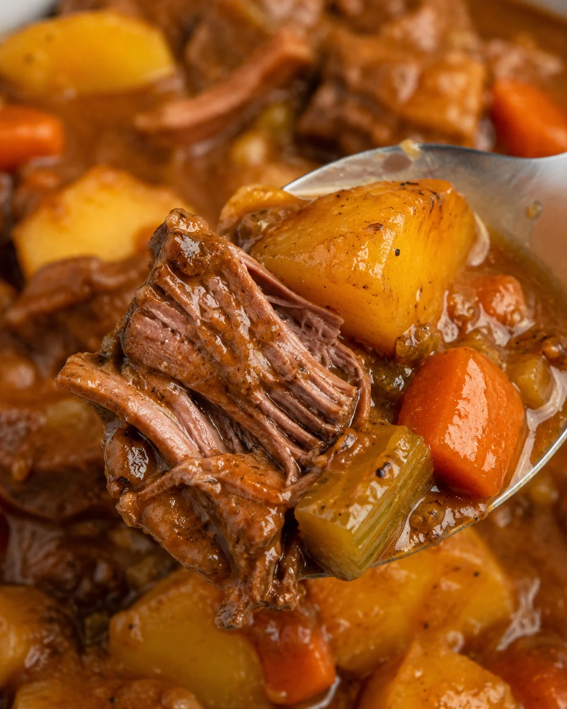 Hearty beef stew with tender chunks of meat, potatoes, carrots, and rich gravy